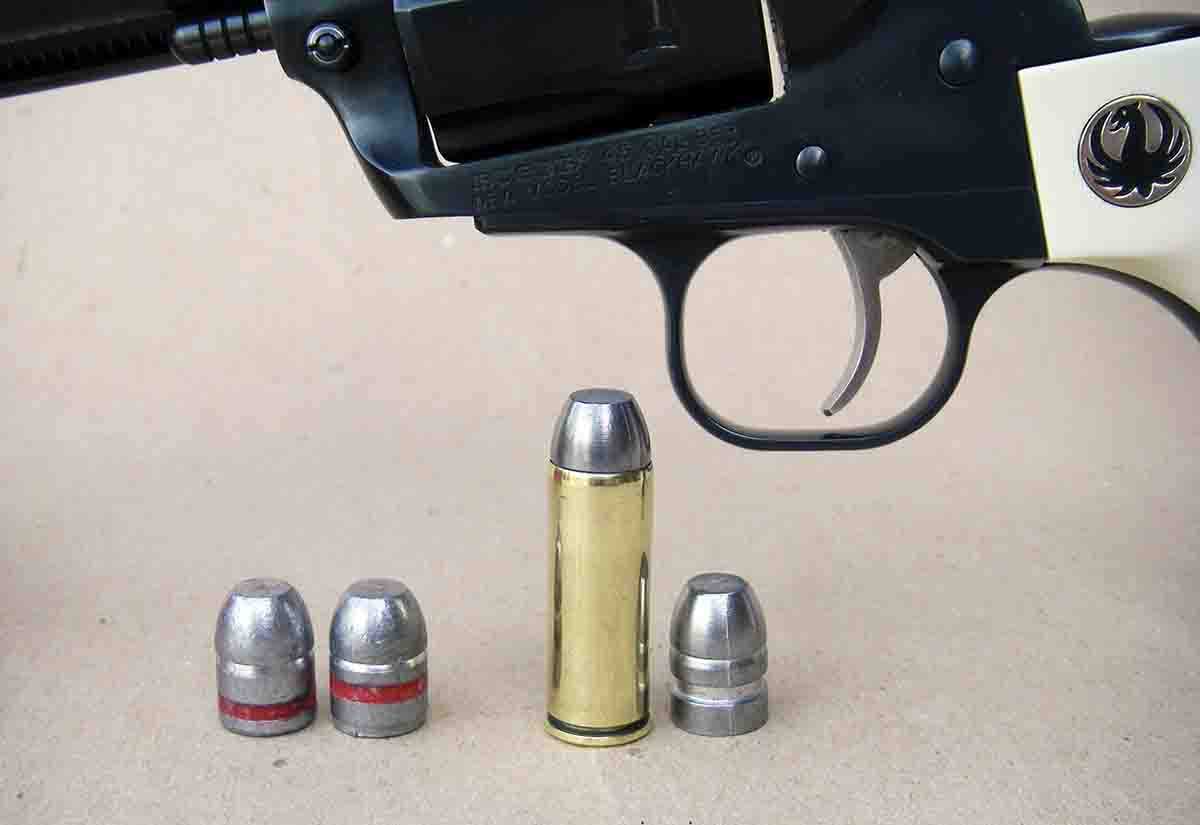 Commercial cast bullets for the .45 Colt that feature the Magma designed 250-grain RNFP bullet vary in design, and many feature a significant bevel base as seen with two bullets at left, which can potentially cause barrel leading. The Redding/SAECO mould No. 955 features (right) a plain base and will function in lever-action rifles and sixguns.